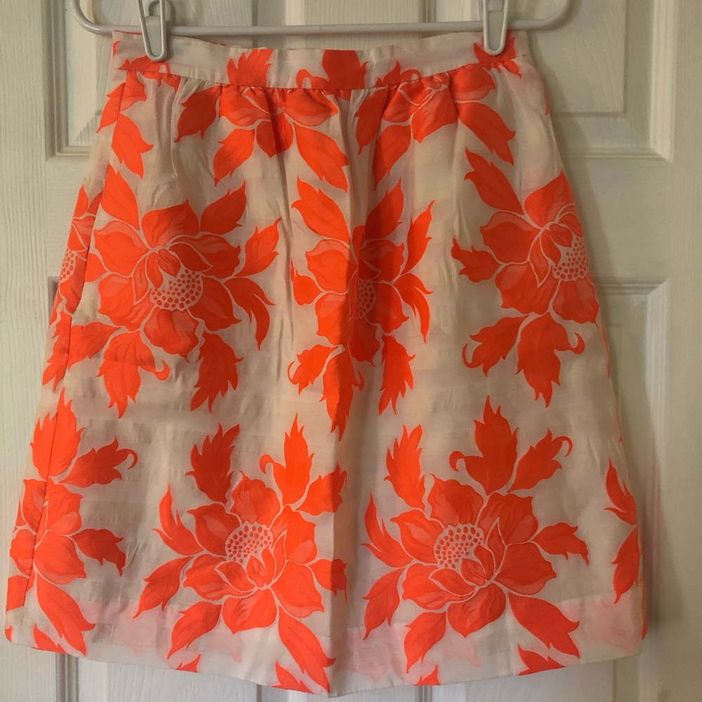 White and orange flowered skirt
